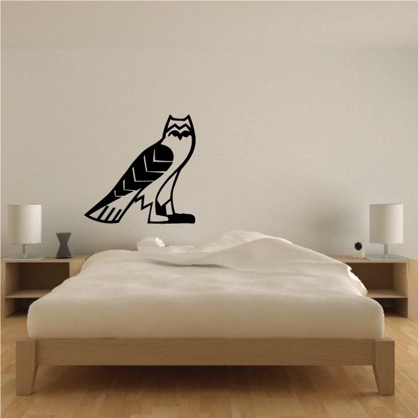 Egyptian falcon wall decal with stylized wings and head, dark linework