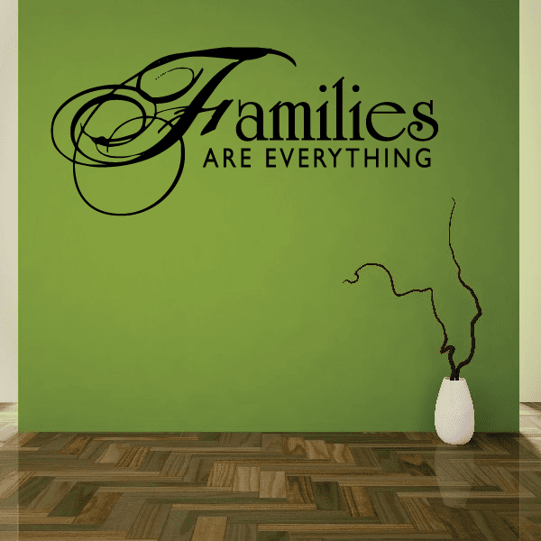 Wall decal: 'Families are everything' with decorative swirl