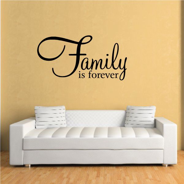 Wall decal in black script reading “Family is forever”