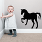 Black walking horse silhouette wall decal with detailed mane and legs