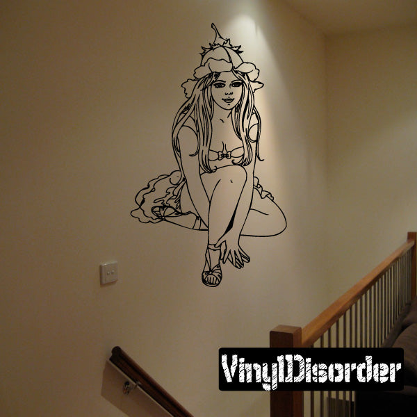 Fantasy girl wall decal of a smiling girl in a flower crown, holding a long dress