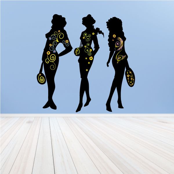 Three girls fashion sticker silhouettes with yellow swirl patterns on black bodies