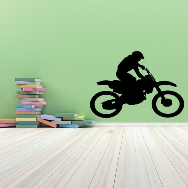 Dirt bike decal with rider silhouette on black motorcycle