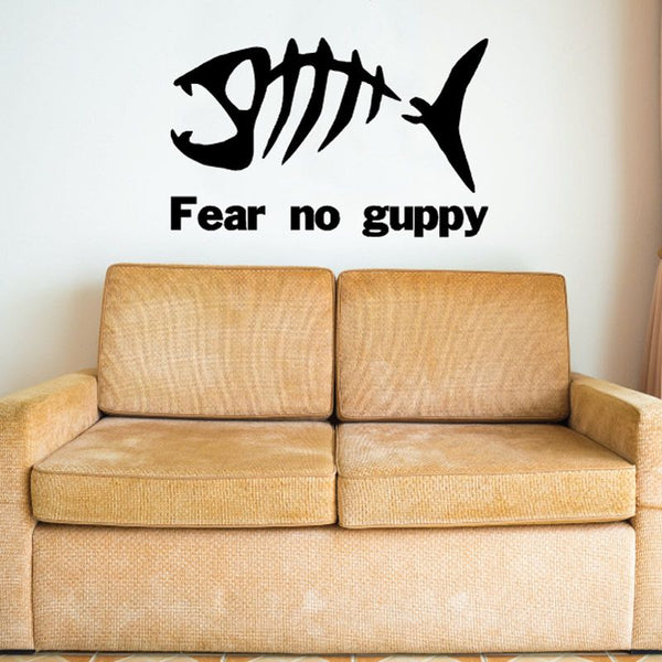 Fish skeleton wall decal with Fear no guppy text, black