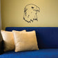 Eagle head decal with black line art outline on a wall