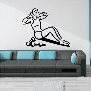 Fitness wall decal of a female doing crunches in black outline