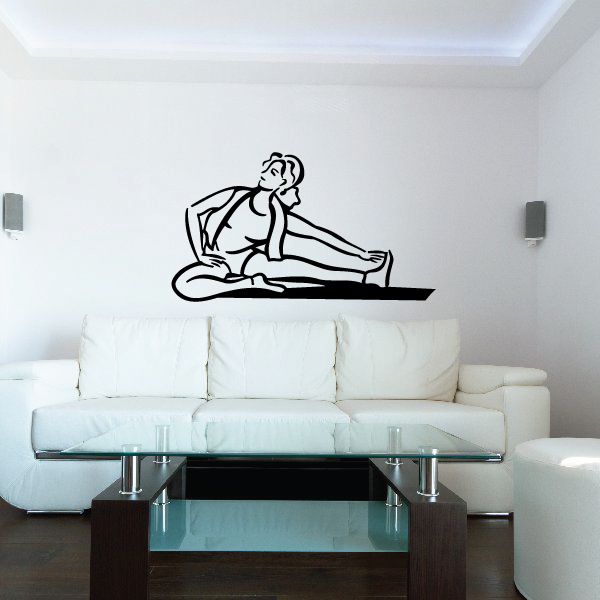 Fitness wall decal showing a woman doing a toe touch stretch on a mat