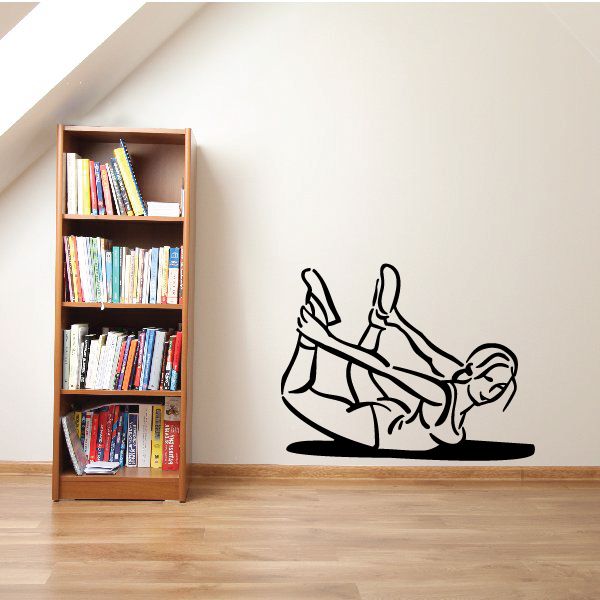 Fitness wall decal of a woman stretching on the floor, grabbing her ankles