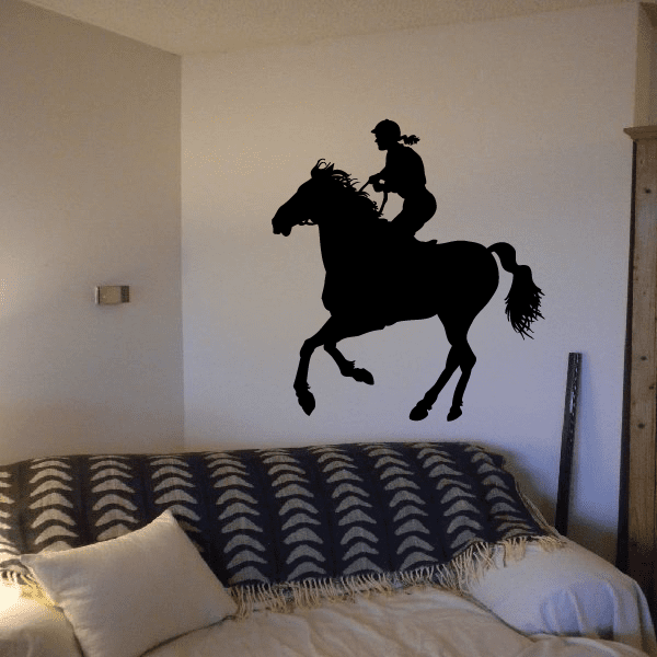 Female horseback rider wall decal with black silhouette on a rearing horse