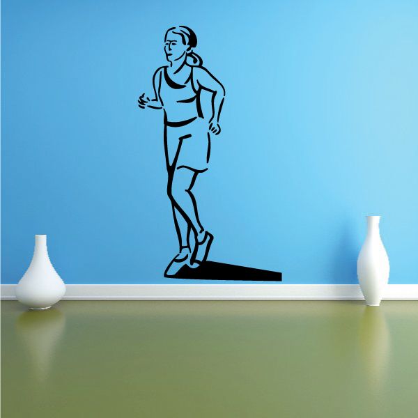 Female running fitness wall decal, black vinyl outline of runner on wall