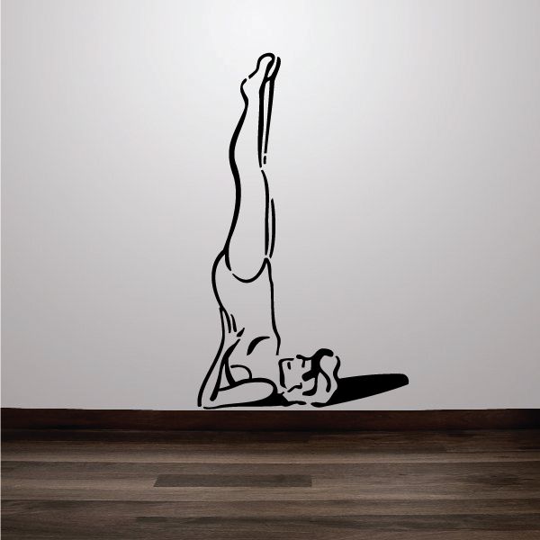 Yoga wall decal of a woman stretching pose, black line art silhouette.