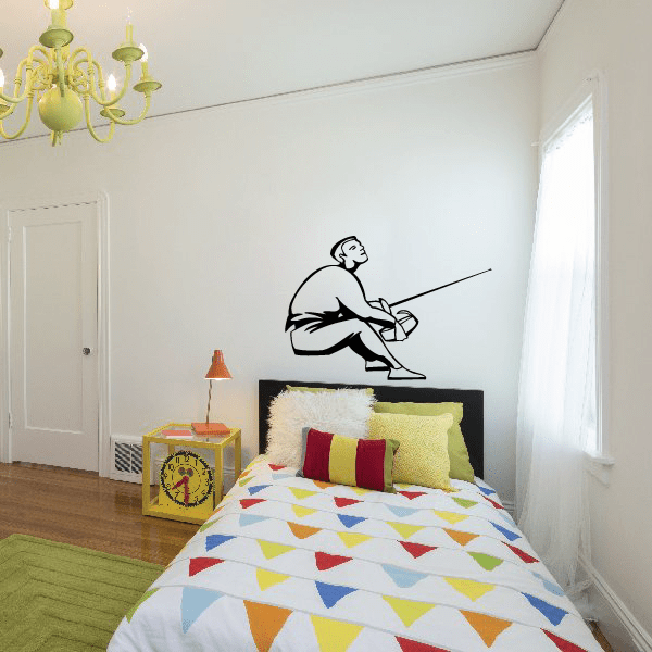 Fencing wall vinyl decal with a black silhouette of a fencer