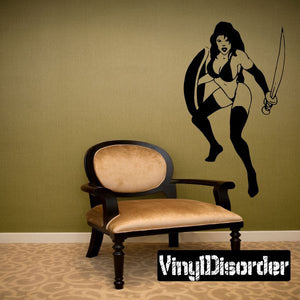 Warrior woman decal holding sword and shield in black and beige tones