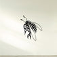 Hornet decal with black-and-white tattoo-style wings and striped body.