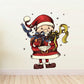 Christmas Santa wall decal in red suit with white trim, holding gifts and bell-like bundle