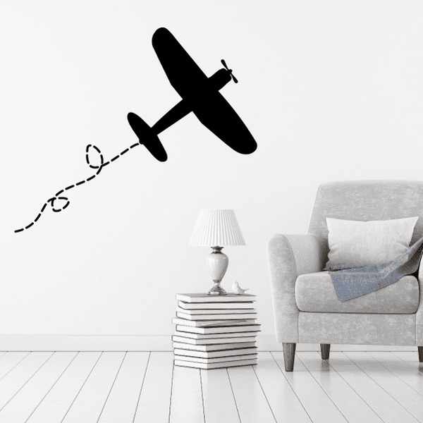 Fighter plane wall decal with dashed flight path and loop trail, black silhouette