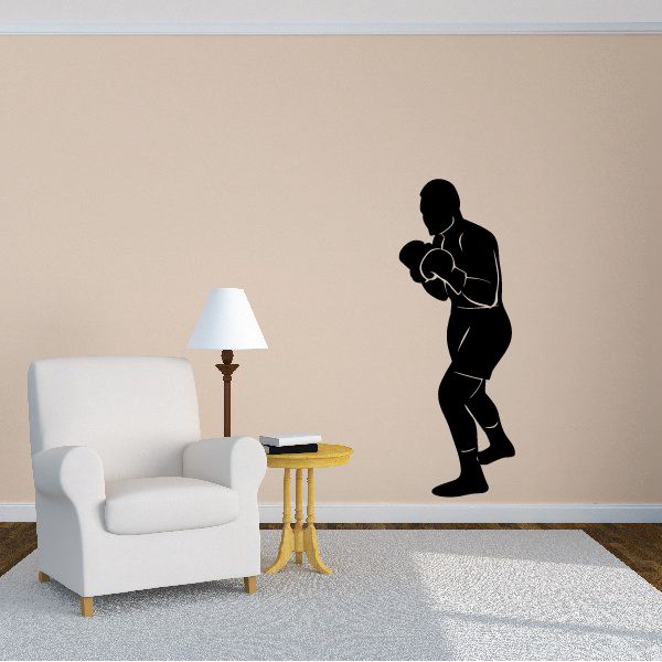 Boxer fighting wall decal, black silhouette in a punching stance.