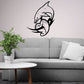 Dolphin wall decal with heart piercing detail, black outline on light background