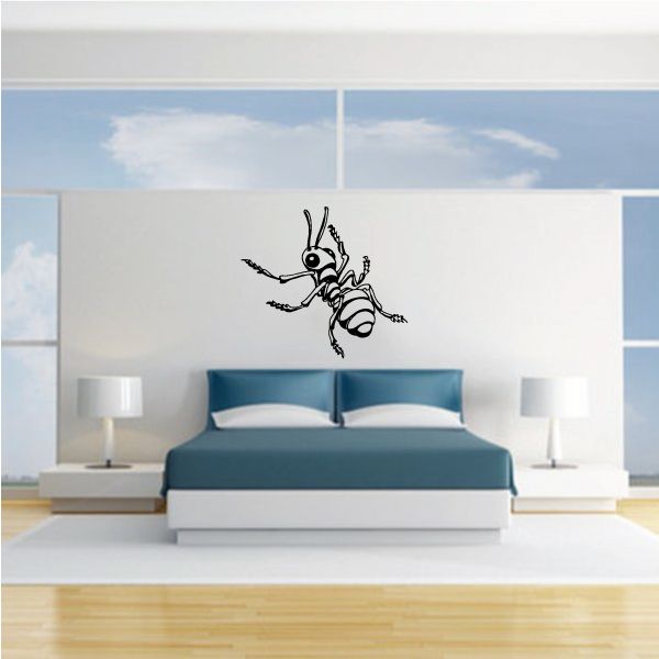 Fire ant facing away vinyl decal, cartoon black and red ant graphic