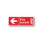 Red fire bucket warning sticker with left arrow and flame icon