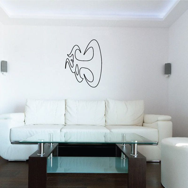 Twisted ghost flame fireball vinyl decal in black line art on white wall
