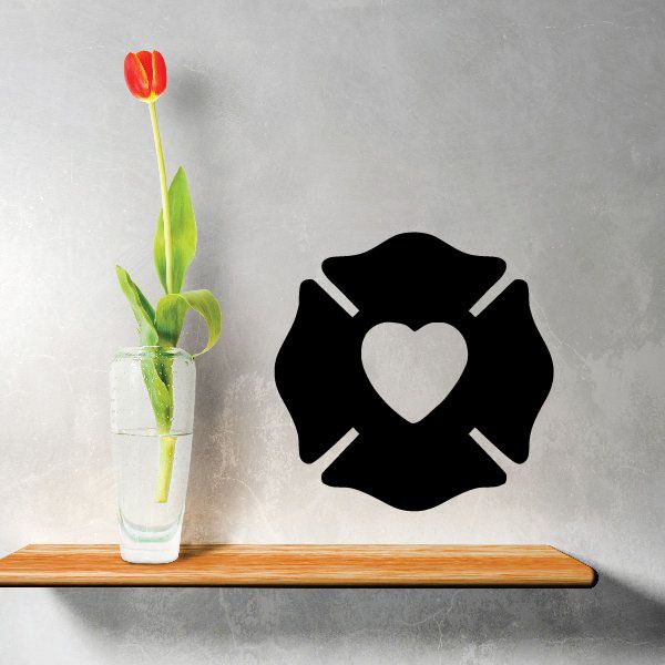 Firefighter heart silhouette decal, black gear-like emblem with heart center