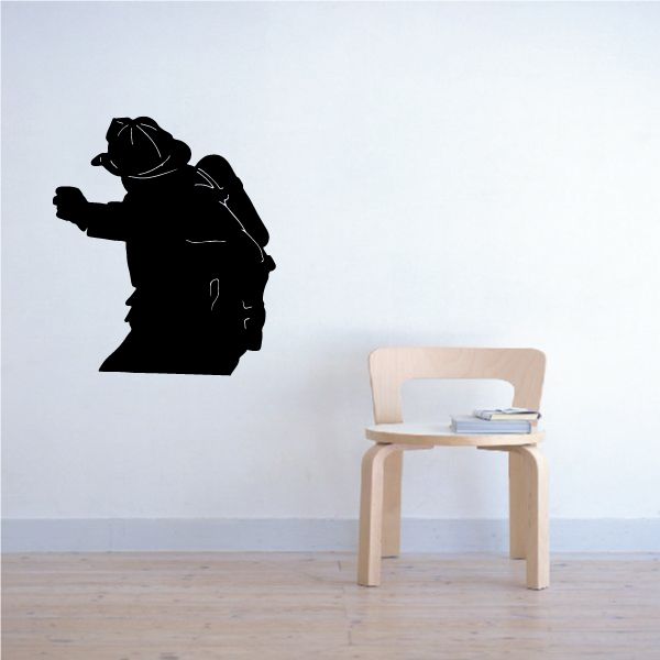 Firefighter silhouette wall decal, black firefighter with open coat facing left