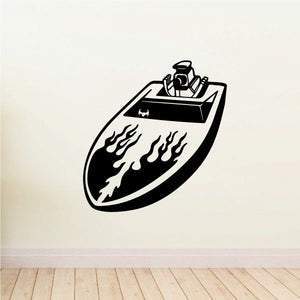 Black speedboat decal with flame design on the hull and steering wheel