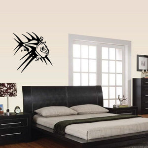 Fish wall decal, black line-art fish with spiky fins on wall