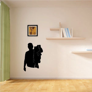 Fisherman holding fish wall decal silhouette