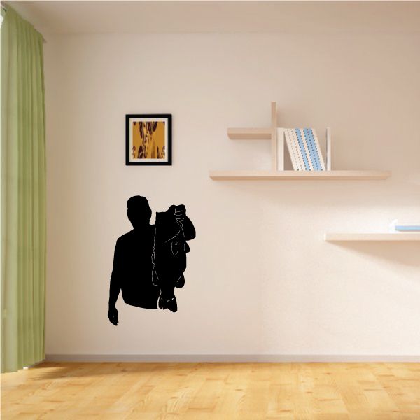 Fisherman holding fish wall decal silhouette