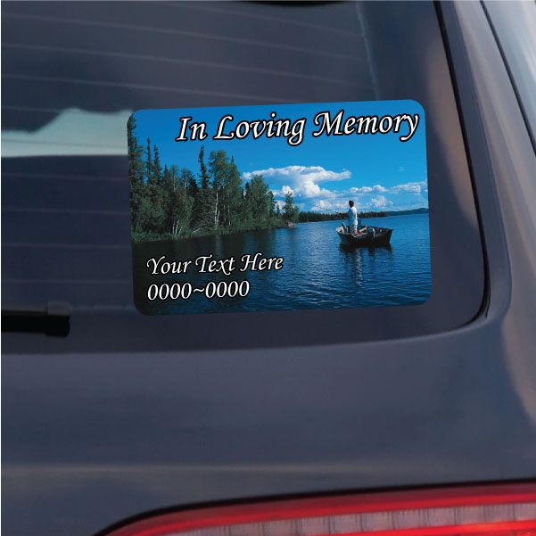 Rounded rectangle memorial sticker with lake scene; 'In Loving Memory' and 'Your Text Here'.