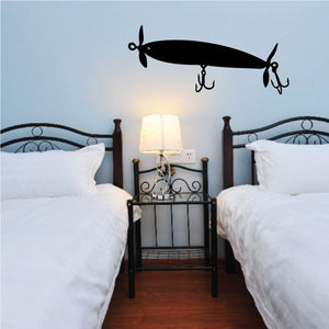 Fishing lure wall decal in black vinyl, long-bodied lure with hooks