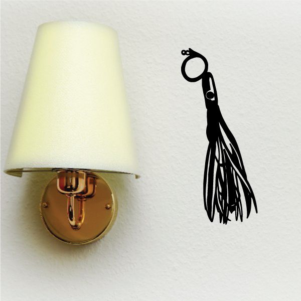 Black fishing lure wall decal with hook and feather tassel