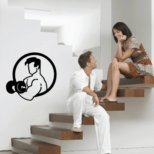 Fitness wall decal: black vinyl outline of a flexing figure with dumbbells