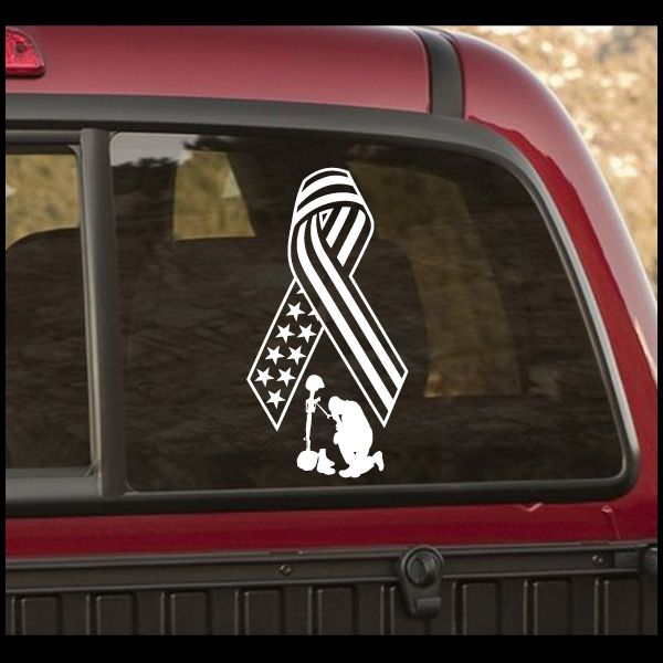 Car window decal: flag ribbon, battlefield cross, and kneeling soldier silhouette