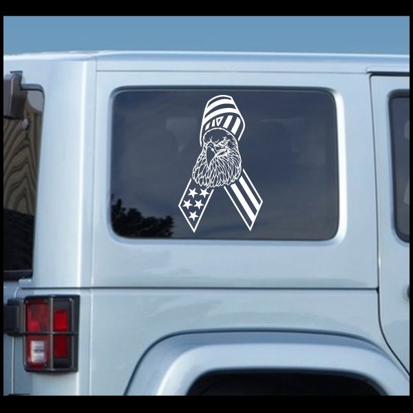 Eagle flag ribbon decal sticker with white emblem on dark vehicle window