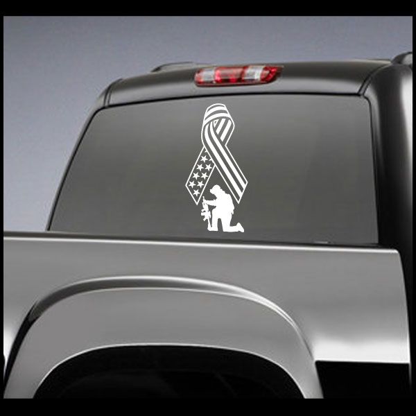Flag ribbon soldier kneeling decal with white soldier and ribbon on dark surface
