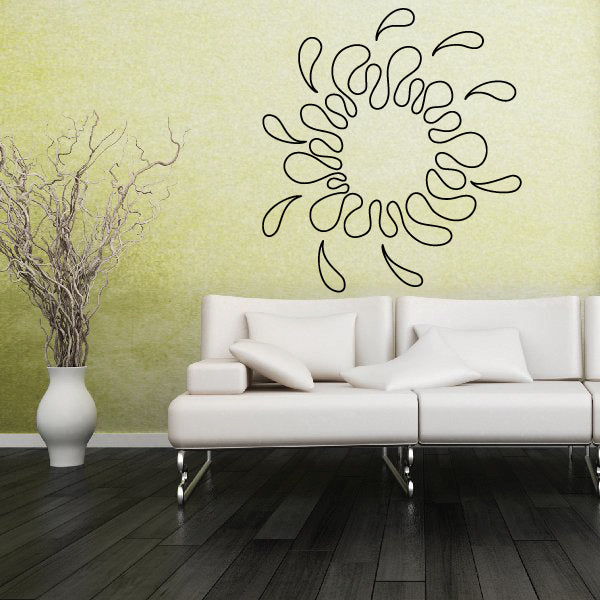 Flame outline decal set with looping flame lines in black, mounted on wall above couch.