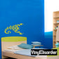 Scorpion flame decal, yellow-green scorpion silhouette on blue wall