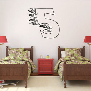Vinyl number 5 decal with flame design, black outline on light background