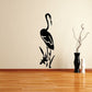 Black flamingo and marsh decal silhouette with raised beak and slender legs