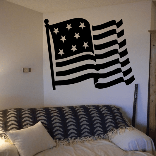 Waving American flag decal with stars and striped banner, black and white design