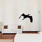 Flapping crane wall decal in solid black, long-wing flying silhouette