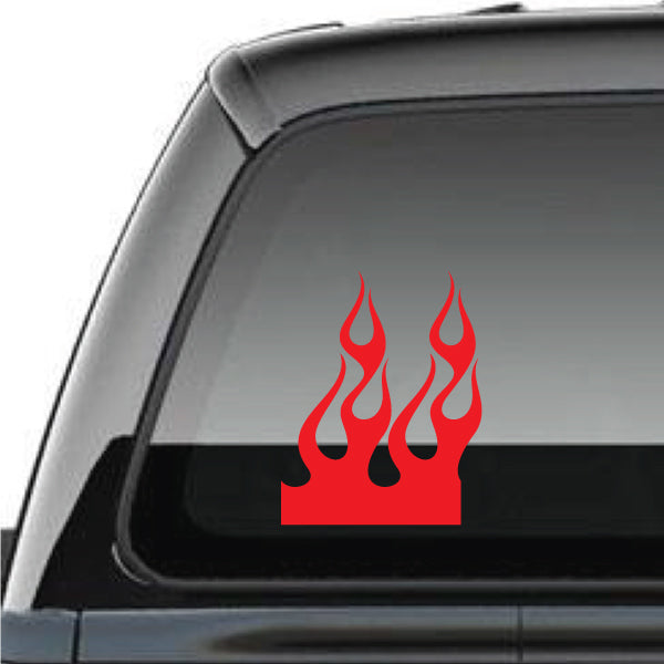 Red flame decal with stacked flame tips on a dark panel