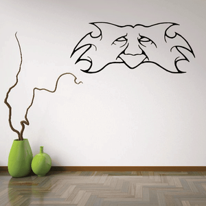 Masquerade mask wall decal with swirl face details and curved ornament accents