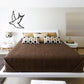 Swallow wall decal with flipping bird design, black outline on light wall