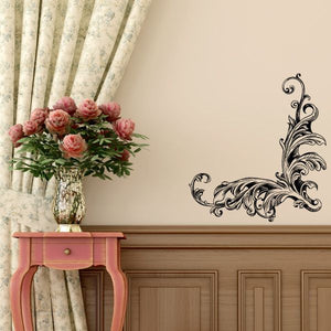 Ornate black vinyl wall decal with scrolling floral corner design
