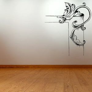 Ornate black damask wall decal with feathered flourish and hanging vertical accents