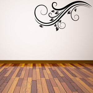 Floral swirl vinyl wall decal with black curving vines and leaf details